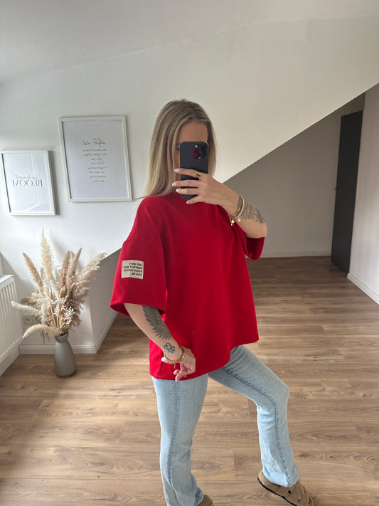 T Shirt LIFE ISN´T PERFECT BUT YOUR OUTFIT CAN BE. Rot